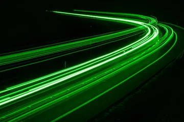 Fototapete Autobahn in der Nacht green car lights at night. long exposure