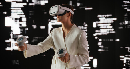 Futuristic Businesswoman Wearing a Virtual Reality Headset and Using Controllers in a Futuristic Room with Cyberpunk Abstract Animation. Young Female Exploring VR Universe, Browsing Internet