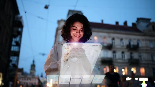 Beautiful Smiling Woman Using Phone on a City Street at Night. Visualization of Social Media, Chatting, Texting, Messaging App Icons. Social Networking Service