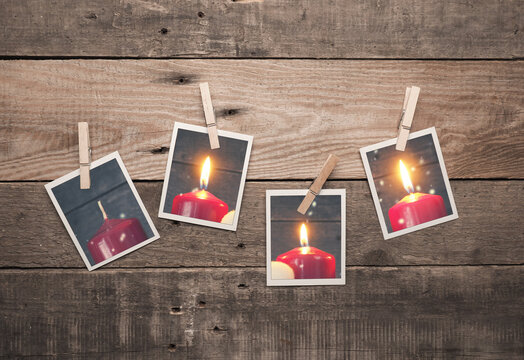 Third Advent, Four old photo frames with Advent candles