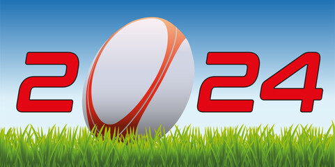 L’année 2024 avec un ballon de rugby posé sur la pelouse d’un terrain pour symboliser le lancement de la nouvelle saison de compétition.
 - obrazy, fototapety, plakaty