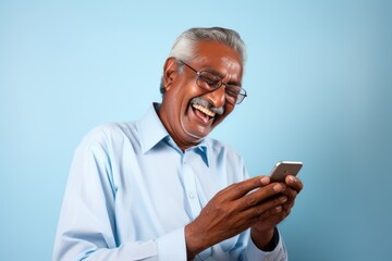 An Old Man Enjoying His Time While Playing With His Cellphone. A fictional character Created By Generated AI.