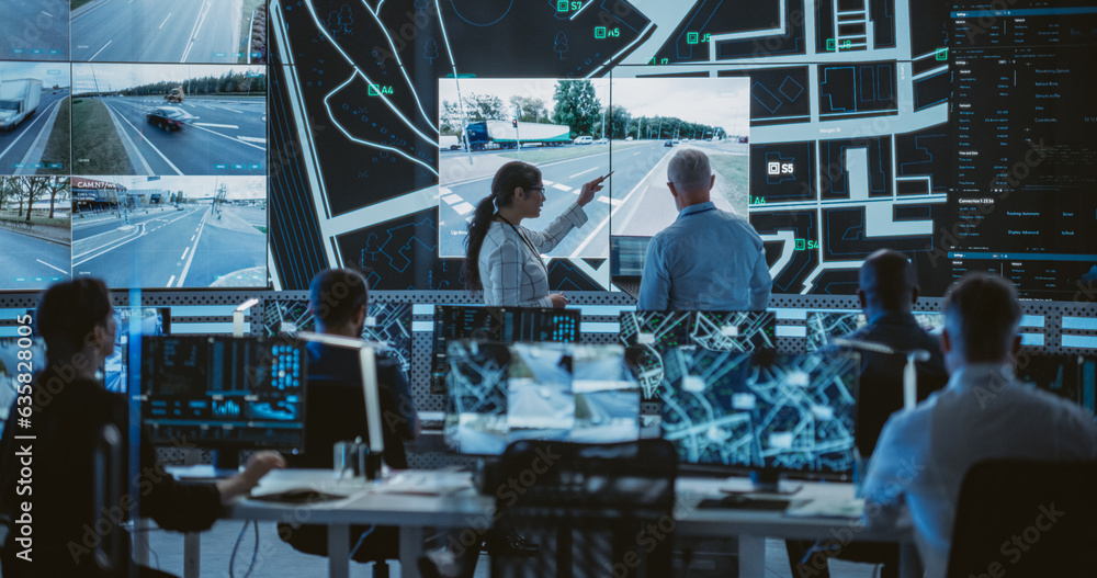 Poster Team of Software Developers, Engineers and Data Scientists Working in a Modern Logistics Technology Company. Male and Female Having a Discussion in Front of a Screen with Surveillance CCTV Footage