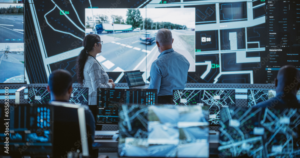 Poster Diverse Team of Specialists Analyze Surveillance Feeds, Monitor Targets on a GPS City Map, Ensure Efficient Traffic Operations. Intensive Work in a Monitoring Room with Big Data Analytics Engineers
