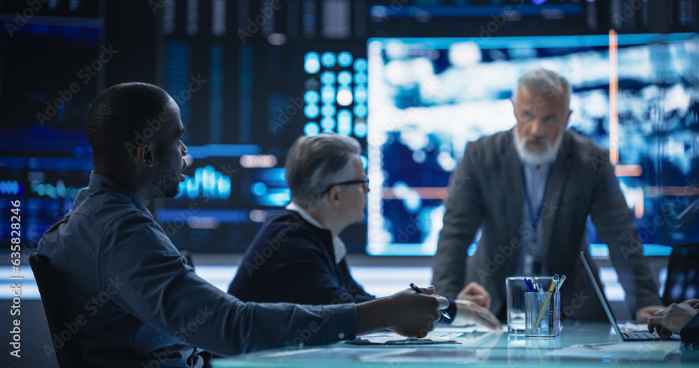 Poster Diverse Group of Cybersecurity Experts Monitoring an Active Operation with Satellite Tracking Technology. Black Male Specialist Pitching an Idea for Tracking a Target Vehicle in Urban Terrain