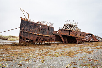 Shipwreck called Amadeo on the  coast of Magellan Strait, rusty warship wreck, Tierra Del Fuego,...
