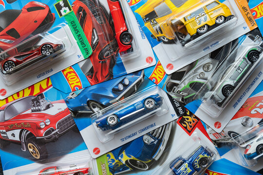 Doha, Qatar - August 17, 2023: Assortment of Hot Wheels die cast carded car model for Hot Wheels series. Hot Wheels is a scale die-cast toy cars by American toy maker Mattel in 1968.