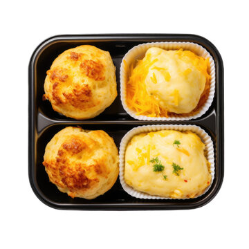 Cottage cheese muffins in a lunchbox top view isolated on transparent background. Generative AI