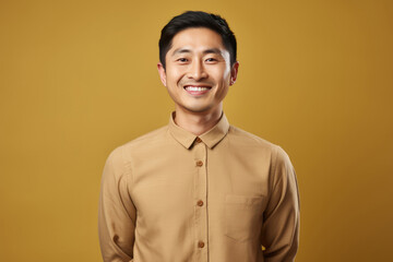 Obraz premium Happy Chinese Man On Beige Background