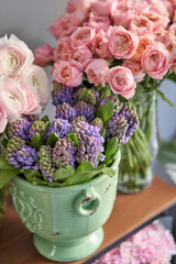 Many different flowers on Showcase. Background of mix of flowers. Beautiful flowers for catalog or online store. Floral shop and delivery concept.