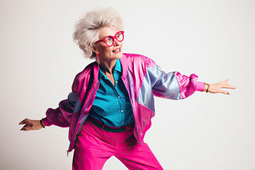 An exuberant older woman with stylish sunglasses and a playful expression, confidently embodying the rich tapestry of age while embracing the joy of life's moments