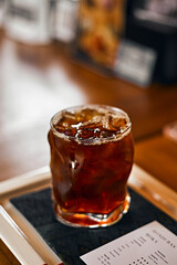 iced black coffee or americano on the wooden table