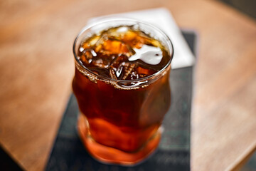 iced black coffee or americano on the wooden table