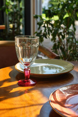 Dining table in the restaurant. Empty glasses set in restaurant. Shallow depth of filed