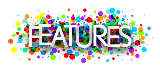 Features sign over colorful round dots confetti background.