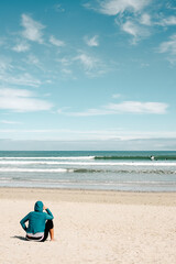 Fototapeta na wymiar lonely person on the beach