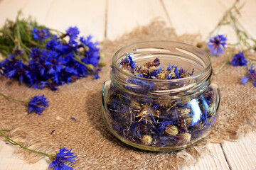 Herbal tea in a glass jar and on a gray background, Immune support.