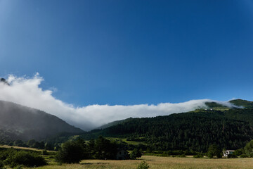 Naklejka premium the area of ​​Larra-Belagua in the Pyrenees, on the way to La Piedra de San Martin, where fog usually makes an appearance. Navarre. Spain