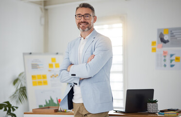 Entrepreneur, mature man and portrait with arms crossed in London, office or workplace for planning...