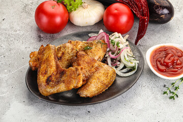 Grilled chicken wings with sauce