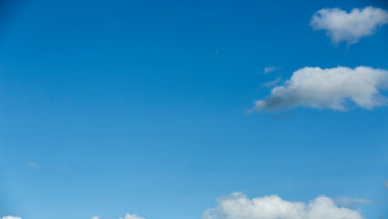 White clouds on blue sky, weather concept