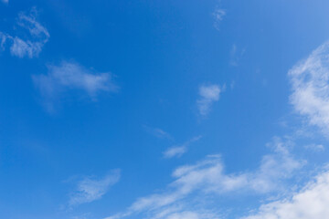 White clouds on blue sky, weather concept