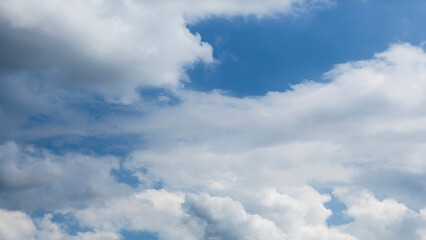 White clouds on blue sky, weather concept