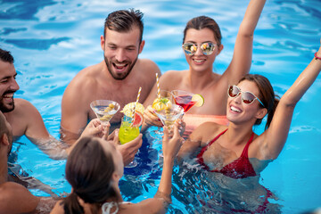 Group of friends have pool party