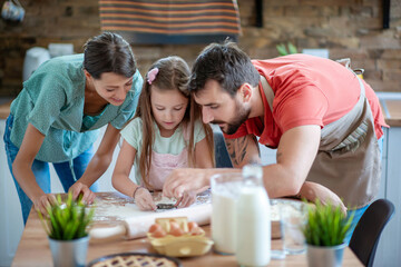 Family having fun in kitchen