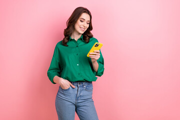 Photo of cute cheerful woman dressed green shirt texting instagram twitter telegram facebook empty...