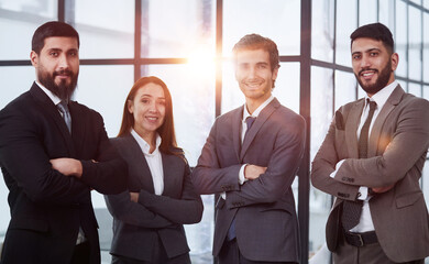 Business people group conference with boss man and woman looking at camera with crossing hand