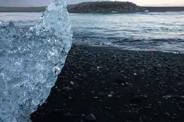 Diamond Beach is a striking black-sand beach famed for the huge, glistening iceberg fragments drifting ashore.