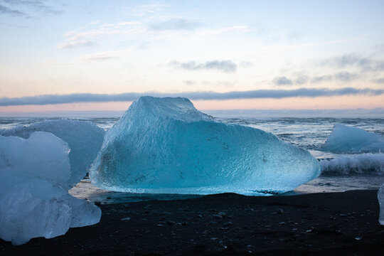 Diamond Beach is a striking black-sand beach famed for the huge, glistening iceberg fragments drifting ashore.