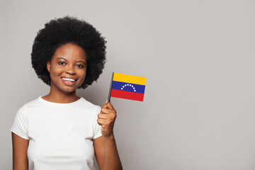 Venezuelan woman holding flag of Venezuela Education, business, citizenship and patriotism concept
