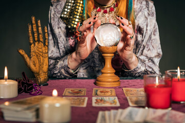 Anonymous soothsayer predicting future with crystal ball