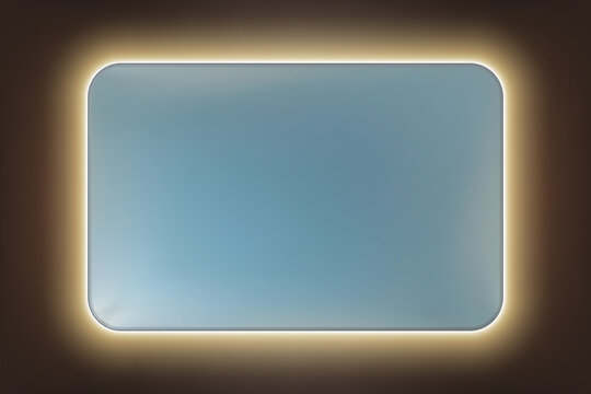 A rectangular mirror with rounded corners and rear LED yellow backlight on a dark wall. Original piece of furniture with modern lighting for bathroom