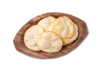 Smoked provolone cheese chips in a bowl isolated over white background
