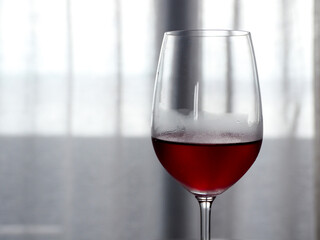 Glass with red wine Romantic getaway.