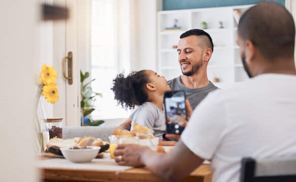 Father, phone screen and photography with girl, breakfast and happy with gay parents, post or memory for blog. Men, daughter and smartphone with profile picture, eating or social media in family home