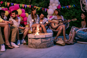 Group of friends having barbecue
