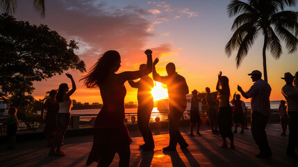 Fototapeta premium Latin party dancing salsa bachata kizomba on the beach at sunset AI image