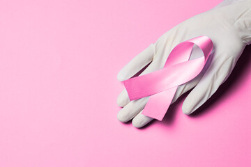 Breast cancer concept, breast cancer awareness, breast cancer day, october, doctors hold pink ribbon, breast cancer awareness, pink ribbon.