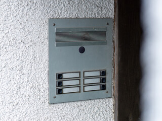 Empty door bell buttons without names. Blank spaces because of residential vacancy. Close up of the...