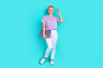 Full length photo of young business lady wearing trendy purple t shirt office manager show okey symbol isolated on blue color background