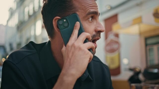 Emotional man yelling smartphone call at city closeup. Gentleman arguing phone