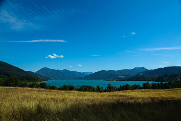 Tegernsee from the mountain, with a blue sky