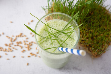 Smoothie with microgreeen and sprouted microgreen wheat sprouts. Healthy food concept
