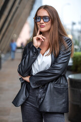 Obraz premium Portrait of a young beautiful brunette woman
