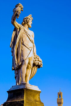 Statue of Autumn, Ponte Santa Trinita, Florence (Firenze), Tower of Palazzo Vecchio, UNESCO World Heritage Site, Tuscany, Italy