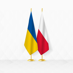 Ukraine and Poland flags on flag stand, illustration for diplomacy and other meeting between Ukraine and Poland.